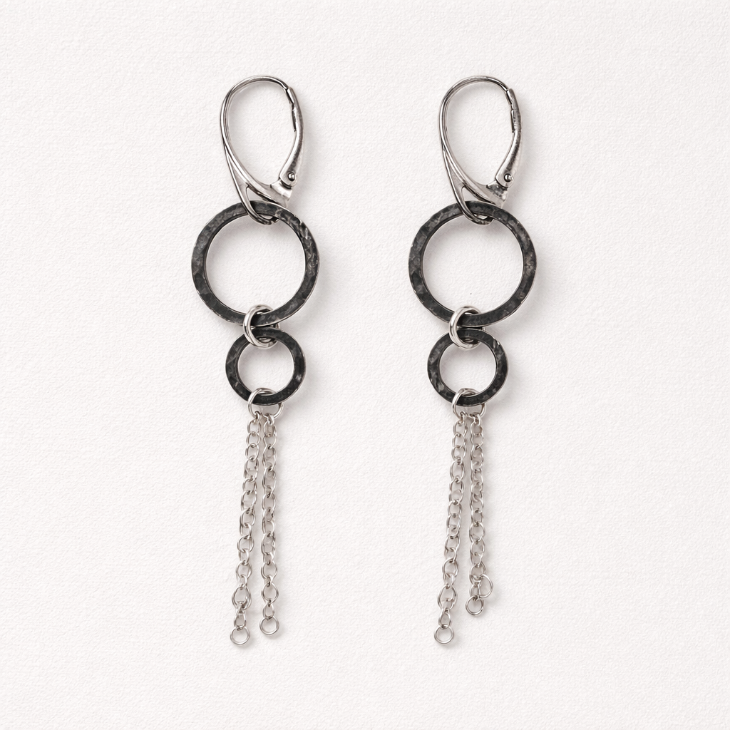 „OXA” oxidative silver earrings & chairs in silver